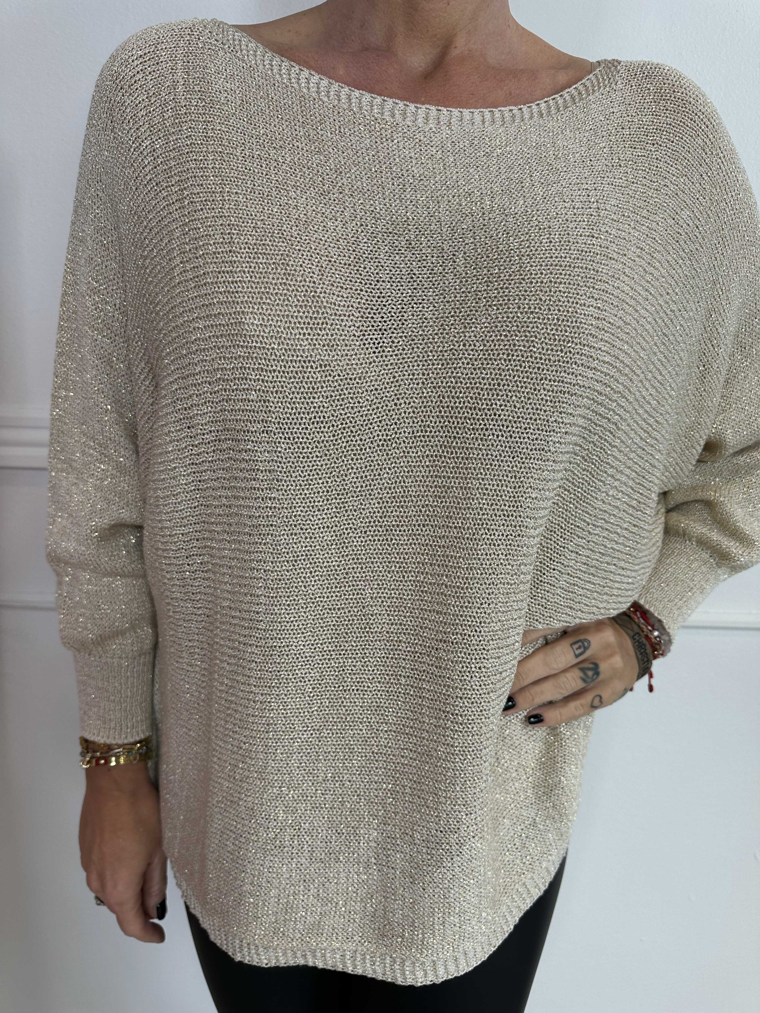 Paulina - Stickad blus med glittertrådar och rosett